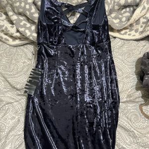 Never worn. Blue/purple color.